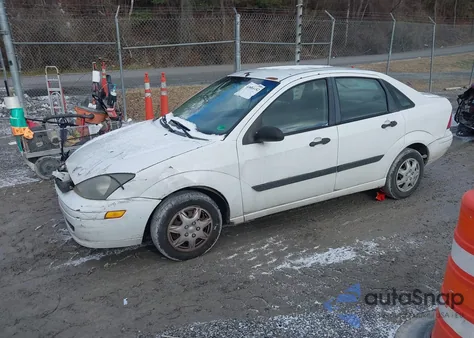 2004 Ford Focus Lx z USA, uszkodzony, nr VIN 1FAFP33P44W195187